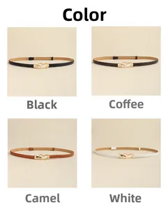 Macro detail of slim leather belts with gold heart buckles in four stylish colors