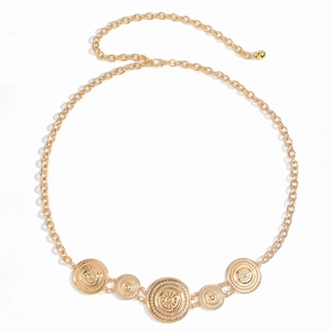 Detailed macro view of vintage golden sun embossed metal belt chain with lobster clasp