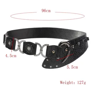 Ceinture noire motif crocodile avec boucle fleur en strass et design asymétrique élégant