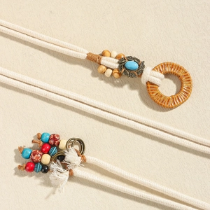 Bohemian hand-woven ethnic waist belt with colorful tassels and turquoise beads