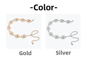 Détail de chaînes de taille vintage en métal avec étoiles en finitions or et argent