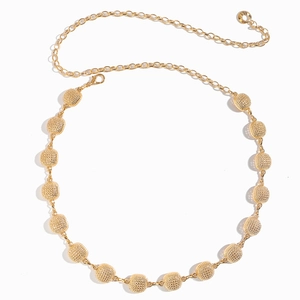Minimalist gold metal waist chain belt with textured circular discs and lobster clasp