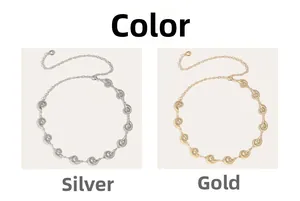 Detailed comparison of seashell waist chain accessories in silver and golden metallic finishes