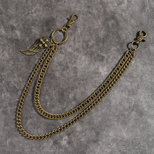 Vintage bronze double-layer pant chain featuring an embossed wing pendant and lobster clasps