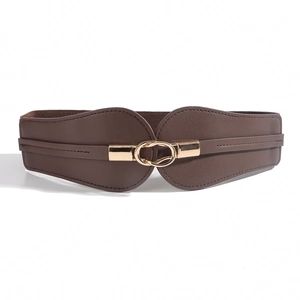 Detail showing the interlocking gold double ring buckle on a brown elastic wide waist belt