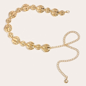 Vintage gold metal waist chain with textured round discs for dresses and jeans