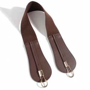 Women's trendy brown elastic waist belt with faux leather details and golden metal buckle