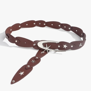 Close-up of vintage brown leather belt with silver star studs and y2k moon shaped buckle