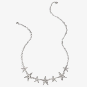 Detail of silver starfish waist chain with textured pendants and adjustable lobster clasp