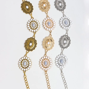 Detailed comparison of gold, silver, and rose gold bohemian floral chain belts with stones