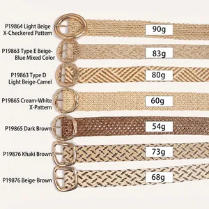 Detail view of bohemian woven belts with diverse straw textures and carved gold buckles