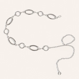 Detail showing polished silver metal link chain belt with oval rings and lobster clasp