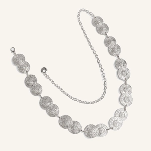 Bohemian silver metal waist chain with textured overlapping discs and adjustable clasp