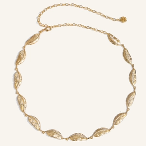 Detail showing the gold leaf chain texture with adjustable lobster clasp and rose pendant