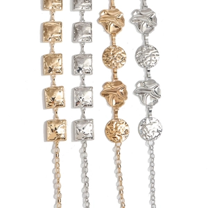 Adjustable minimalist metal waist chain with geometric textured plates in gold and silver