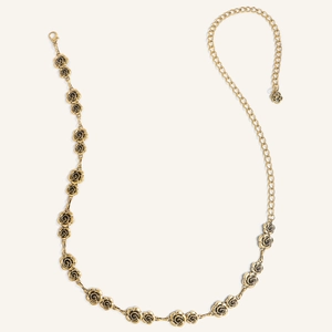 Cintura a catena vintage in metallo dorato con rose intagliate e smalto nero
