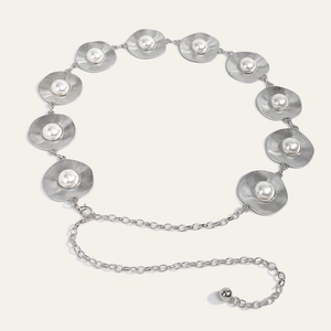 Close-up of silver metal waist chain featuring pearl-inlaid discs and adjustable lobster clasp