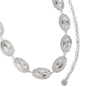Detailed close-up of silver metal waist chain featuring hammered oval links and rose pendant