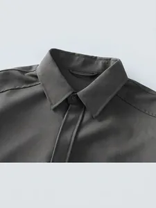 Dark grey business casual shirt with premium collar detail and textured long sleeve fabric