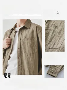Detail view of khaki long sleeve shirt featuring drop shoulder cut and textured pocket