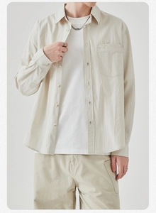 Front view of beige men long-sleeved shirt styled with a white t-shirt and cargo pants