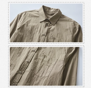 Detailed close-up showing texture of olive green long-sleeved shirt with chest pocket