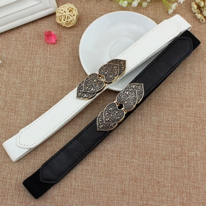 Vintage elastic waist belts with carved golden heart buckles in black and white colors