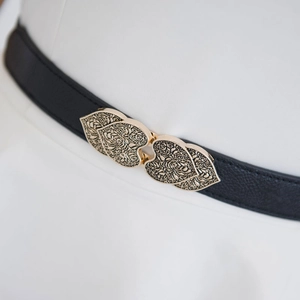 Vintage skinny elastic belt for women featuring a gold double heart buckle with floral relief