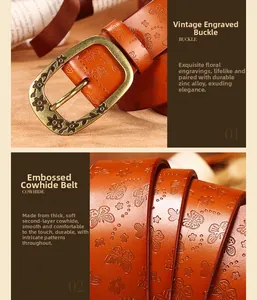 Detail of vintage carved alloy buckle and floral embossed genuine leather strap