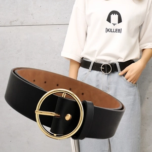 Women's black leather belt featuring a classic round golden buckle with a casual fashion look