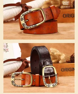 Detailed close-up of embossed floral patterns on premium leather belts in camel and brown
