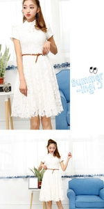 Detail of white lace short sleeve dress featuring a brown braided thin waist belt