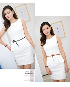 Detail of slim braided PU leather belt styled with an elegant white ruffled peplum blouse