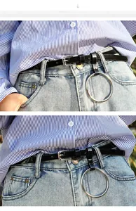 Vue détaillée de la fine ceinture en cuir PU noir avec boucle argentée et grand anneau en métal