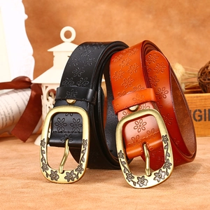 Vintage floral embossed leather belts in black and reddish brown with bronze buckle