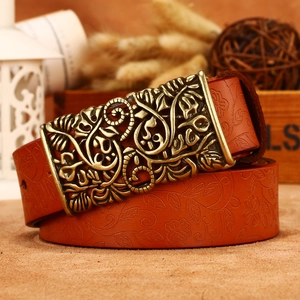 Vintage floral embossed brown leather belt with ornate bronze hollow buckle for women