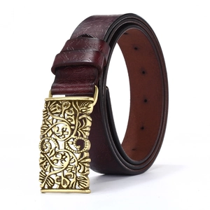 Vintage wine red floral embossed leather belt with ornate hollowed gold metal buckle