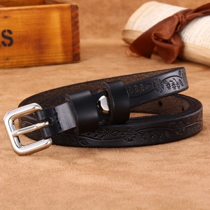Slim black leather belt for women featuring vintage embossed flower and leaf patterns