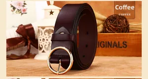Close-up of women's vintage coffee leather belt featuring a polished gold round buckle