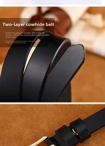 Detailed macro view of black split cowhide leather belt showing fine grain and gold buckle
