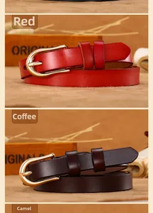 Detail view of slim leather belts in red, coffee and camel colors with gold buckles