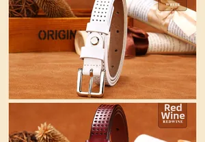 Detail view of hollow out white and redwine leather belts with silver pin buckles