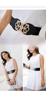 Close-up of interlocking heart buckle on a black elastic waist belt for dresses