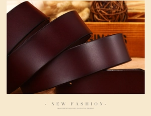 Close-up of premium dark brown leather belt showing smooth texture and polished edges