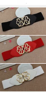 Detailed view of elastic wide belts in black, red, and white with golden metal buckle