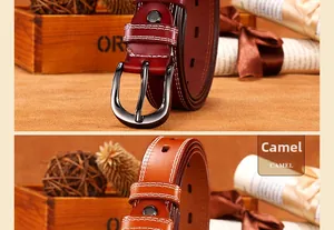 Detail of burgundy and camel leather belts with contrast stitching and metal pin buckle