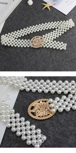 Macro detail of elastic triple-row pearl belt with vintage floral gold rhinestone buckle