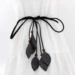 Elegant black woven waist chain belt featuring leaf tassels and wood beads for women