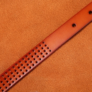 Brown hollow genuine leather belt with pin buckle and geometric laser cut pattern for women