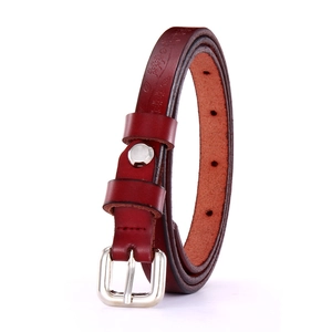 Deep burgundy women's hollow leather belt with silver pin buckle and floral pattern